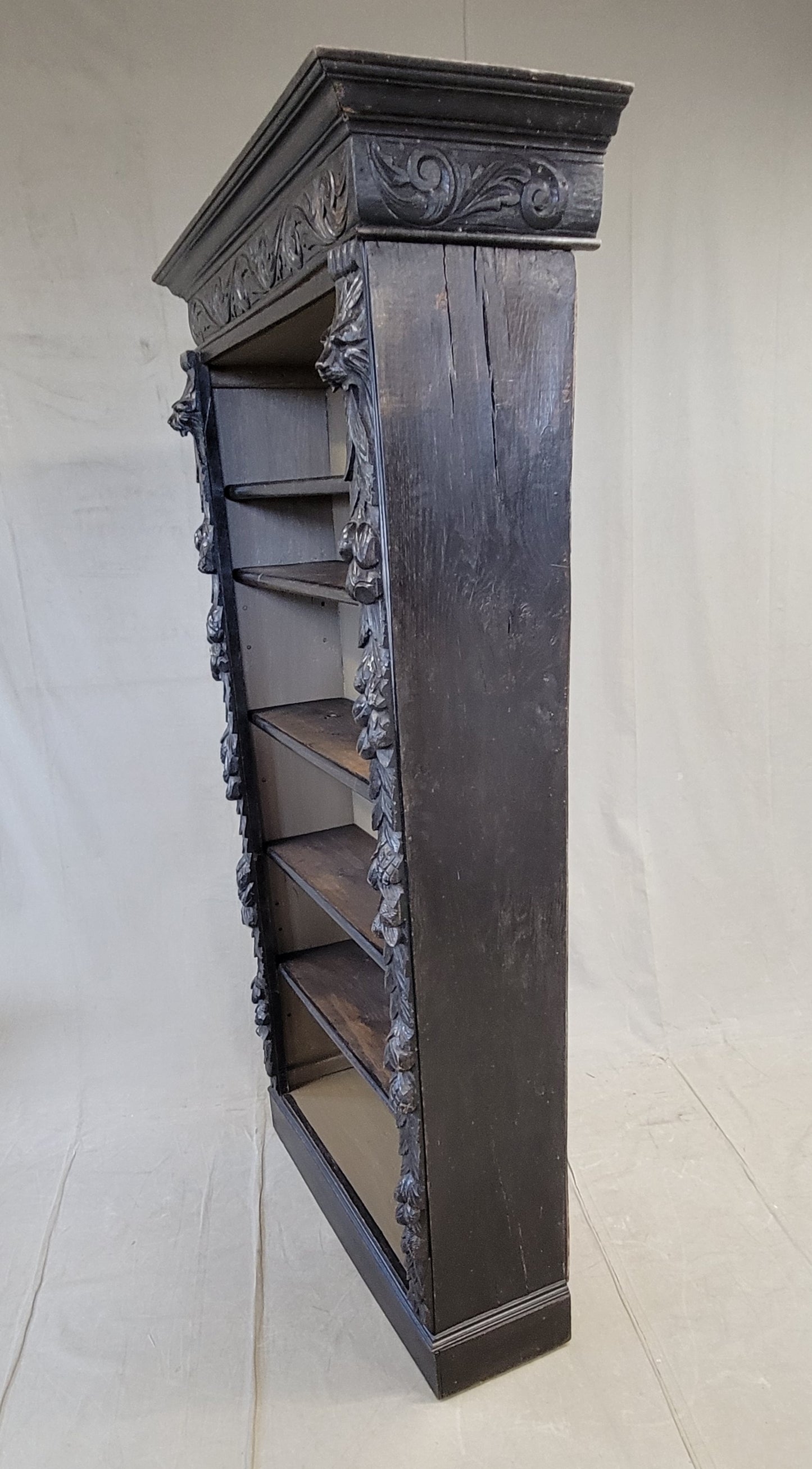 Vintage European Ebonized and Carved Oak Adjustable Shelf Bookcase