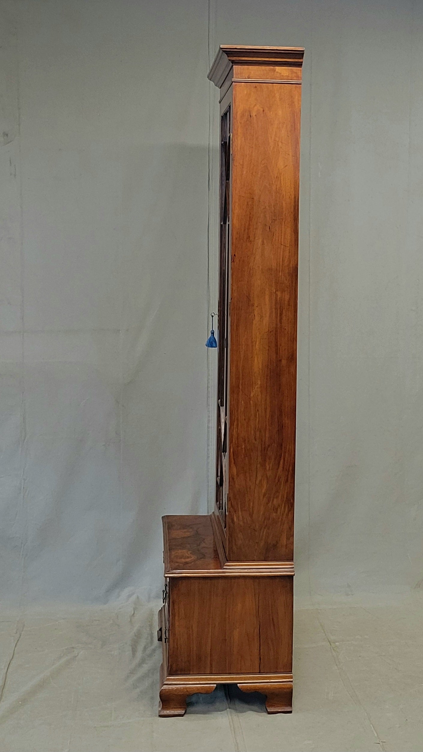 Antique English Mahogany Single Glass Door 2-piece Curio Display Cabinet