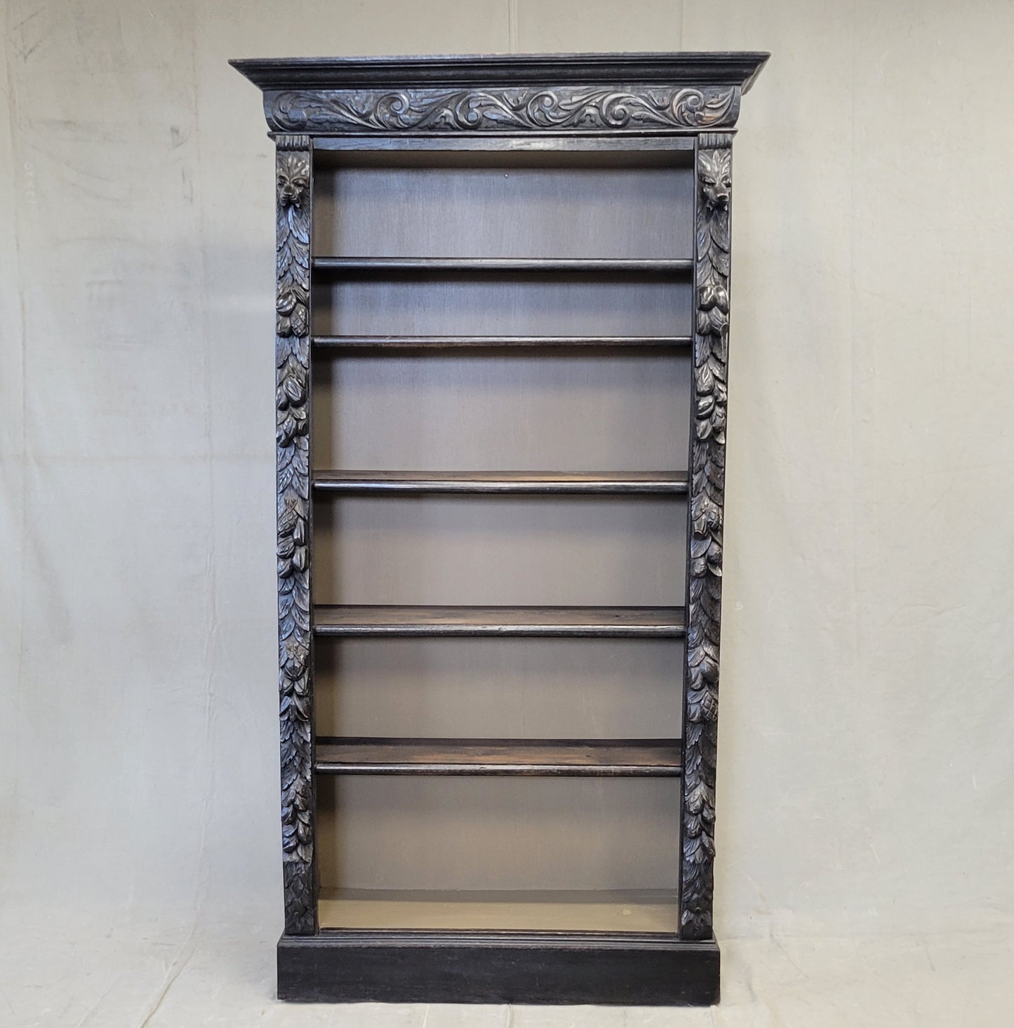 Vintage European Ebonized and Carved Oak Adjustable Shelf Bookcase