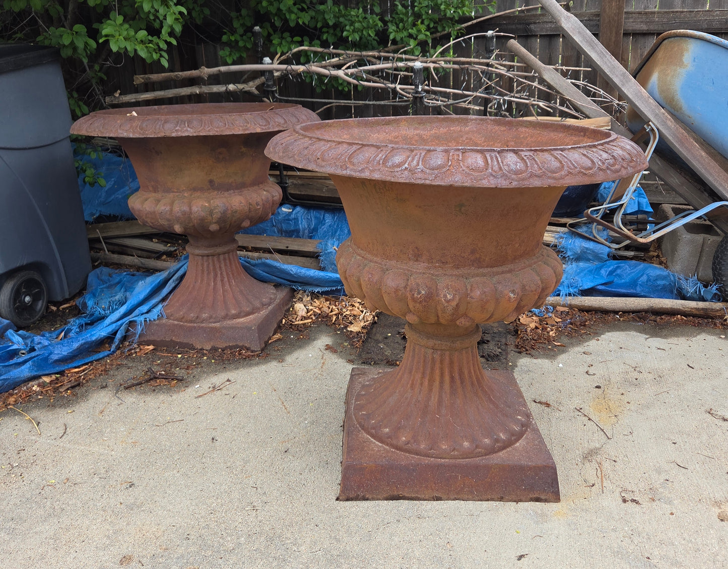 Pair of iron urns