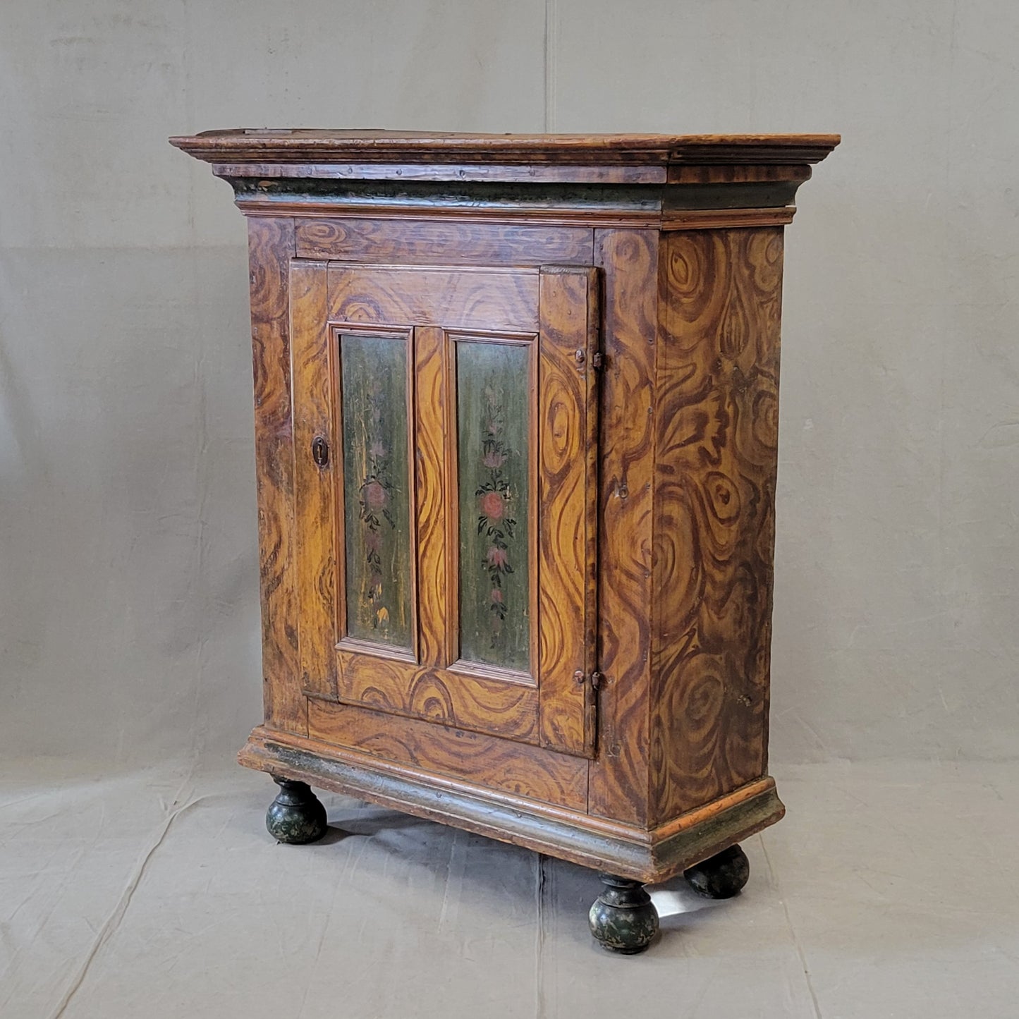 Antique 19th Century Austrian Pine Cupboard With Original Faux Bois Paint and Floral Accents