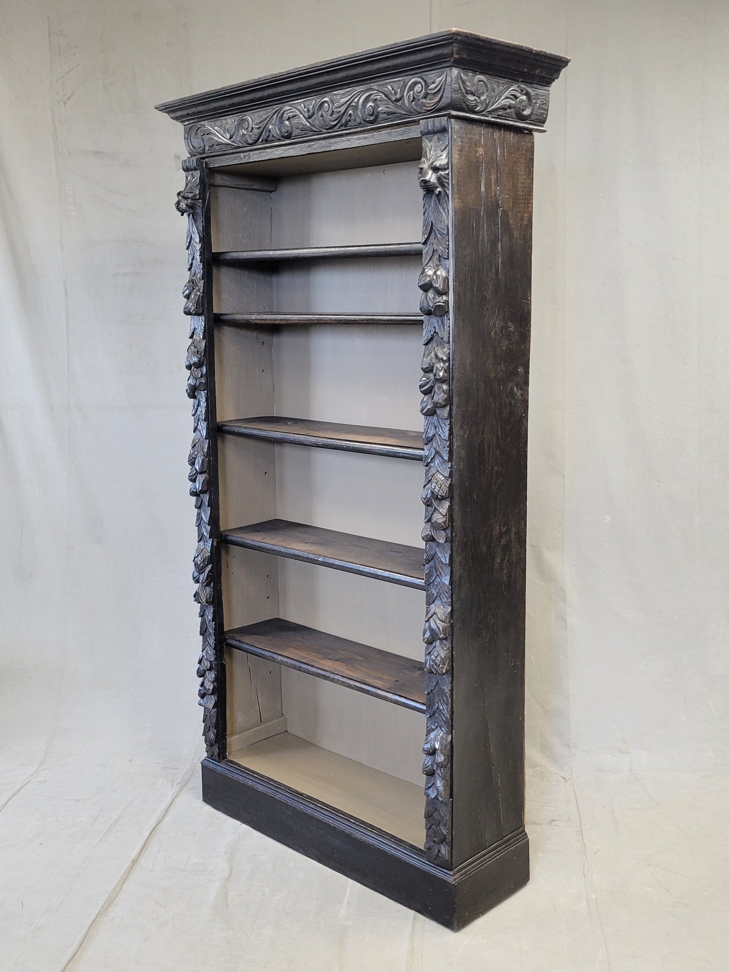 Vintage European Ebonized and Carved Oak Adjustable Shelf Bookcase
