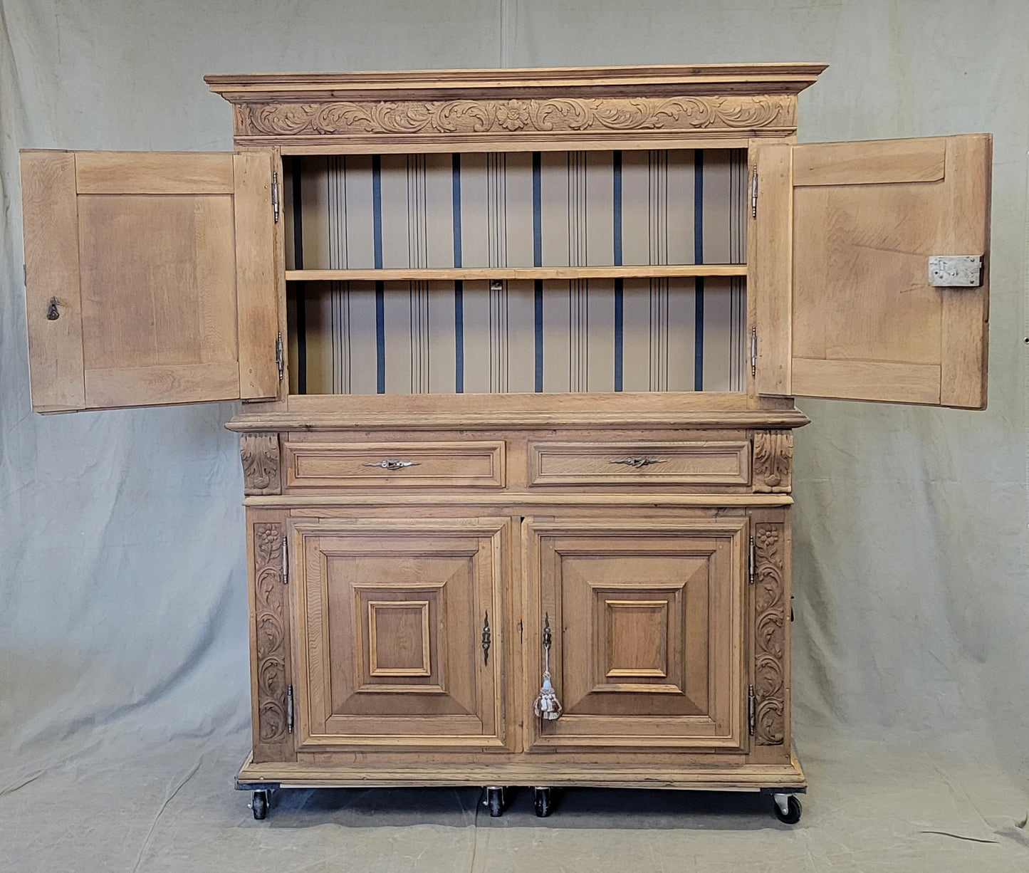 Antique French Bleached Oak and Pine Deux Corps Carved Cupboard With Blue French Ticking Interior