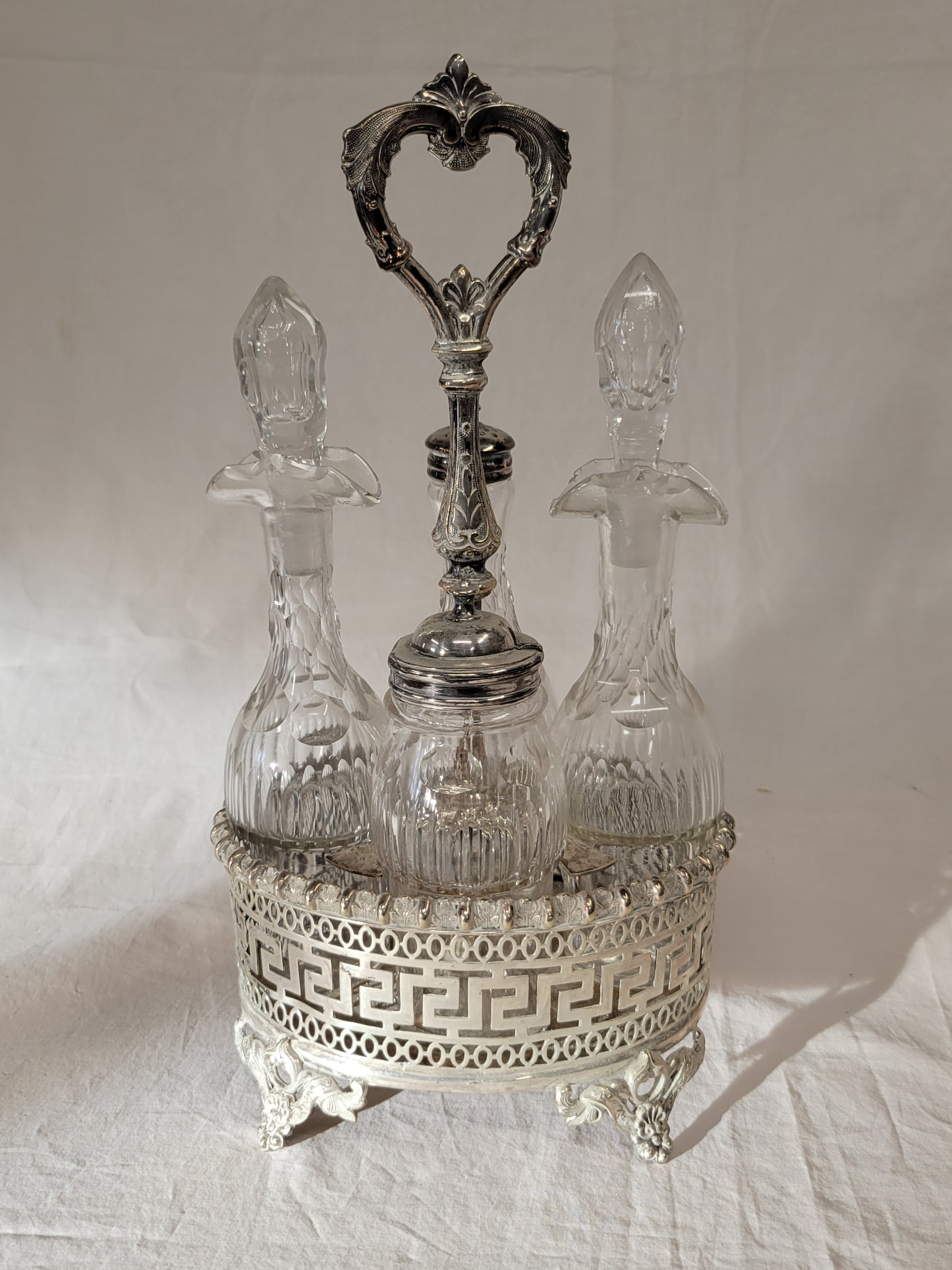 Antique Silverplate and Crystal Four Bottle Cruet Set