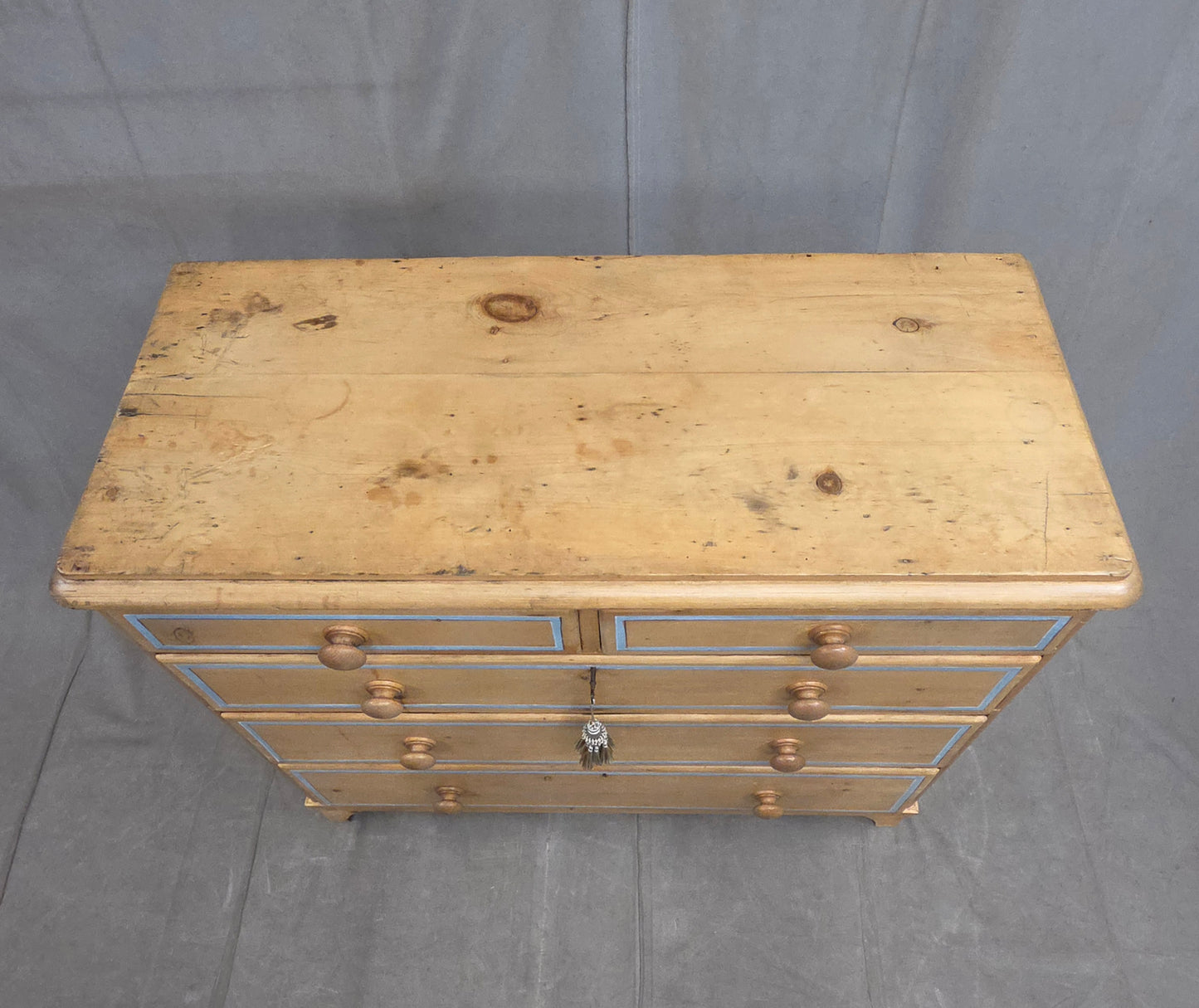 Antique English Edwardian Natural Pine Chest of Drawers with Blue French Line