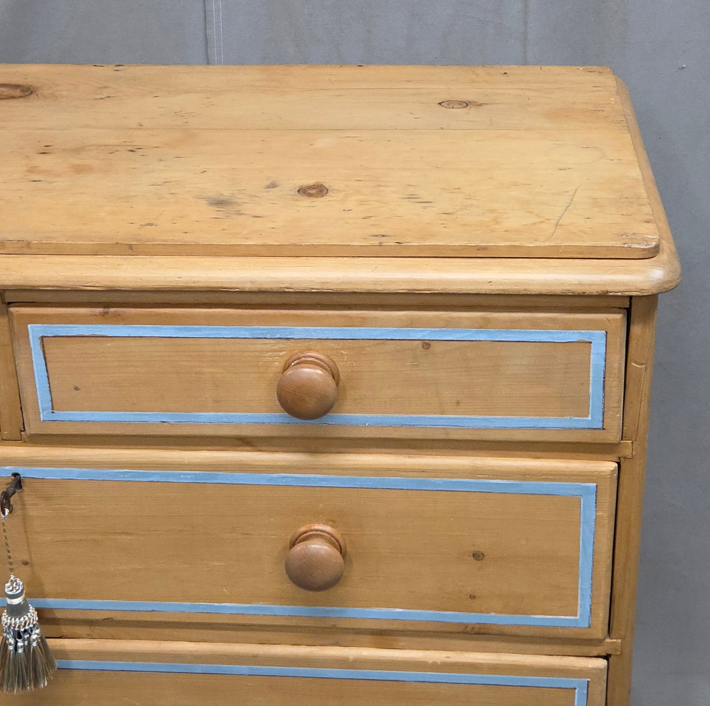 Antique English Edwardian Natural Pine Chest of Drawers with Blue French Line
