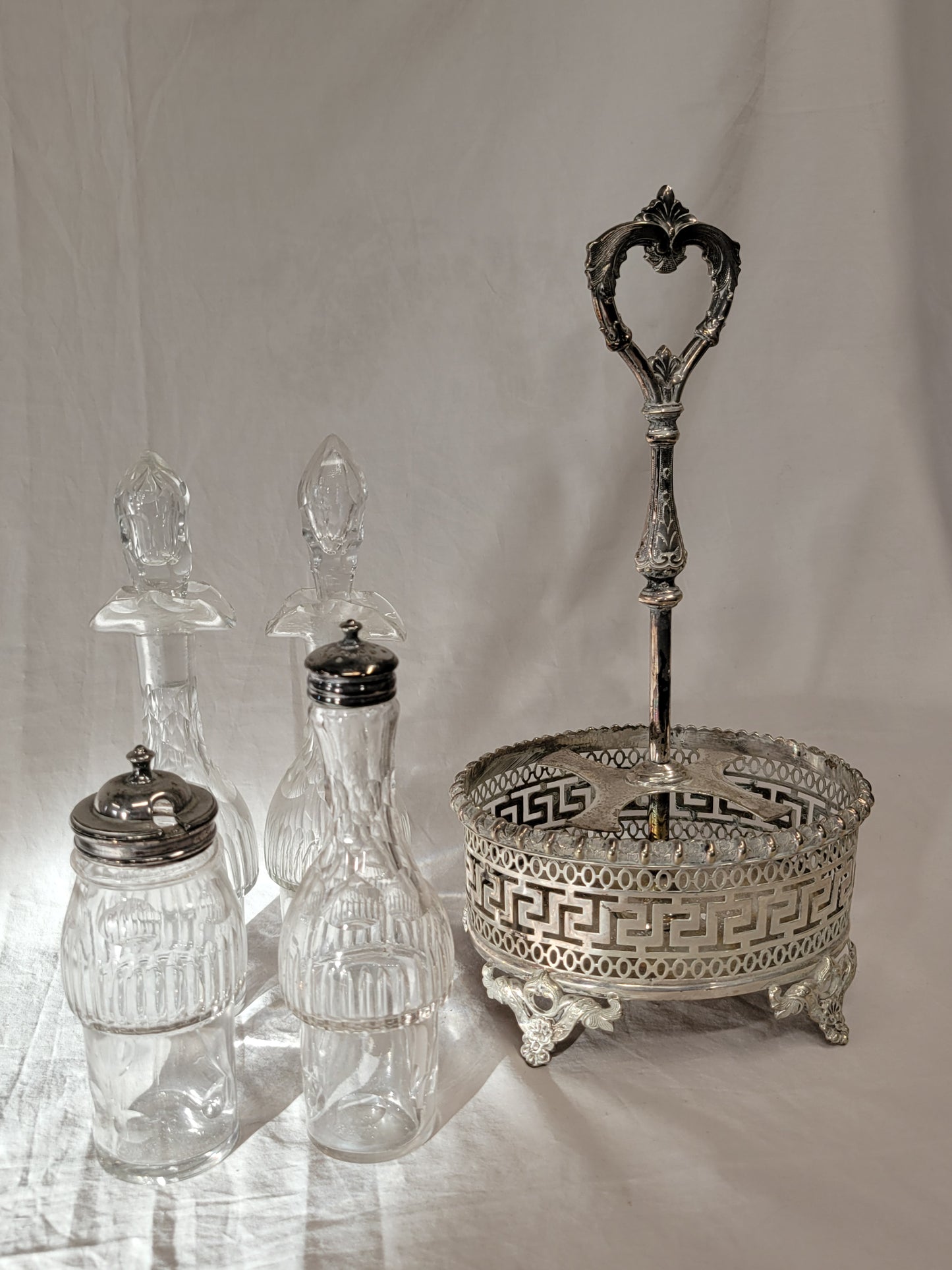 Antique Silverplate and Crystal Four Bottle Cruet Set