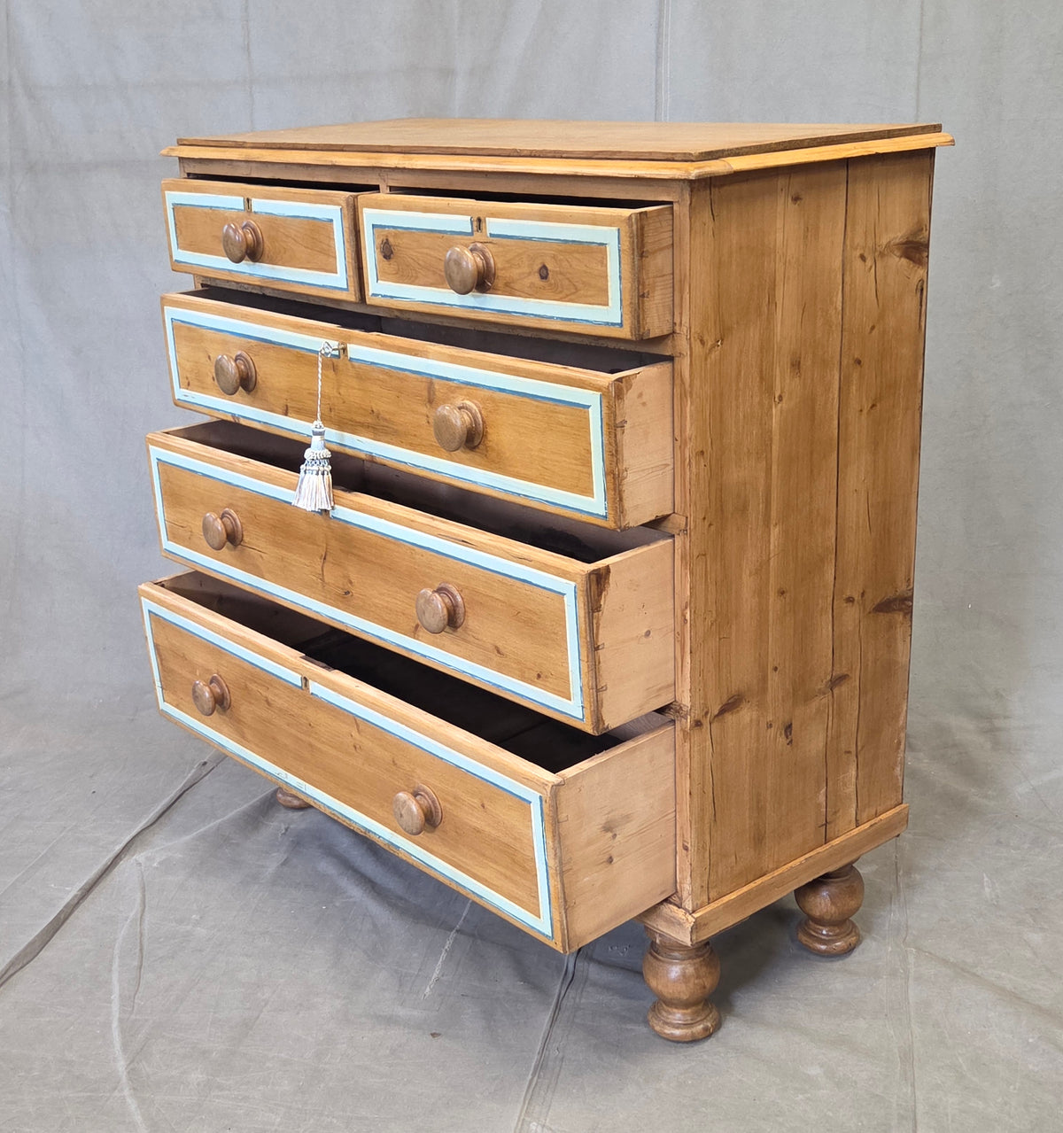 Antique English Edwardian Natural Pine Chest of Drawers with Blue French Line
