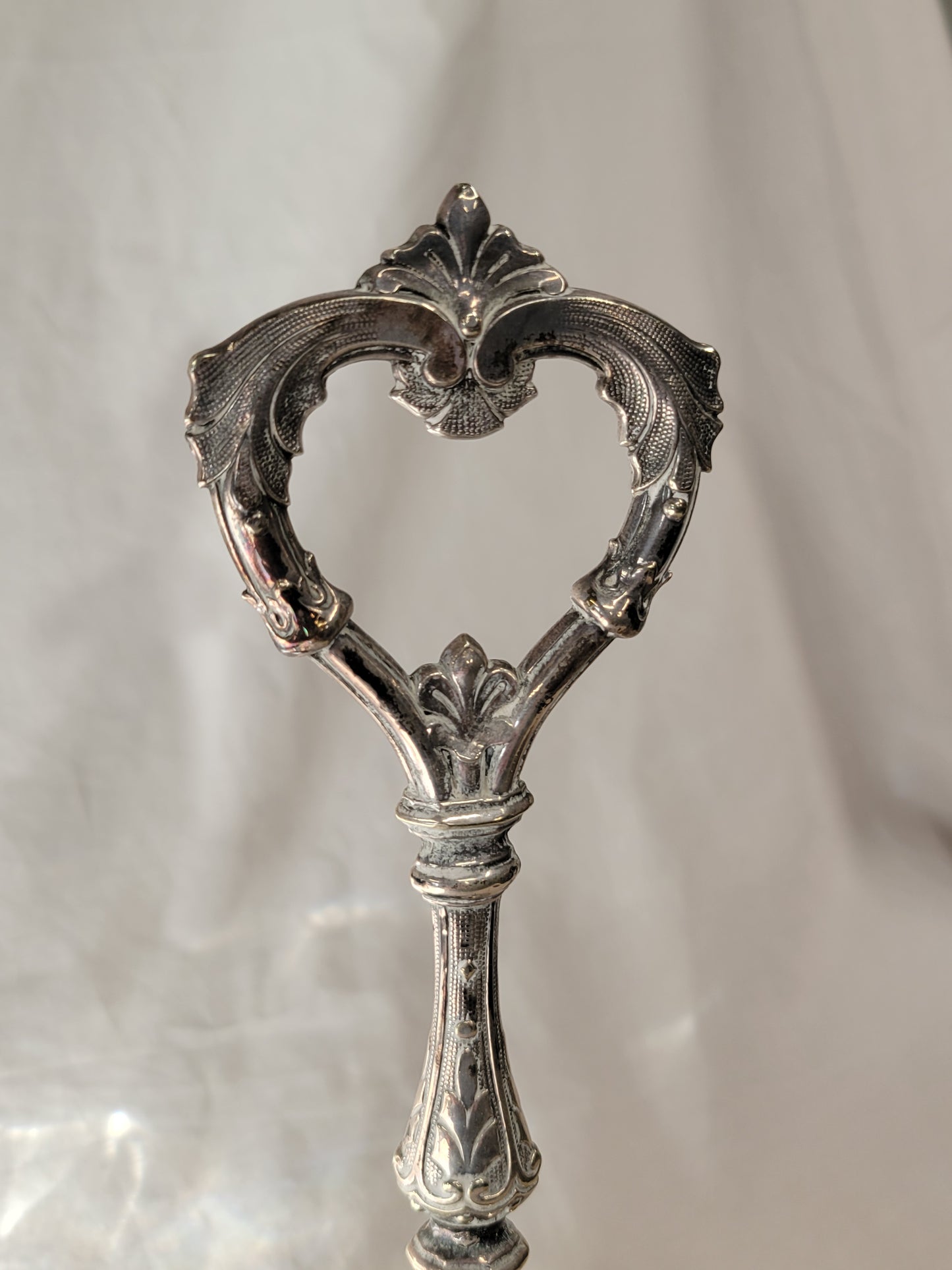 Antique Silverplate and Crystal Four Bottle Cruet Set