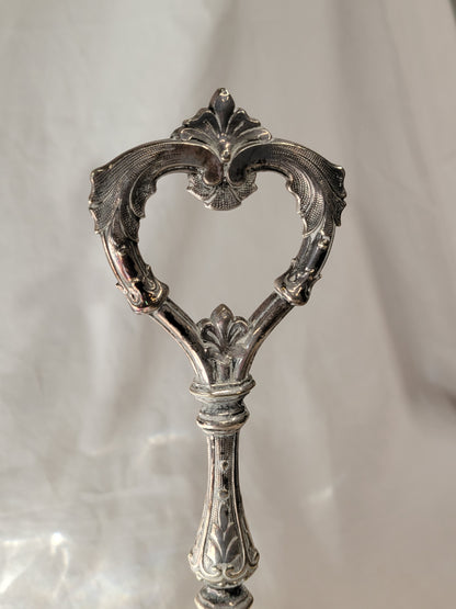 Antique Silverplate and Crystal Four Bottle Cruet Set