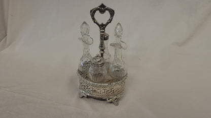 Antique Silverplate and Crystal Four Bottle Cruet Set